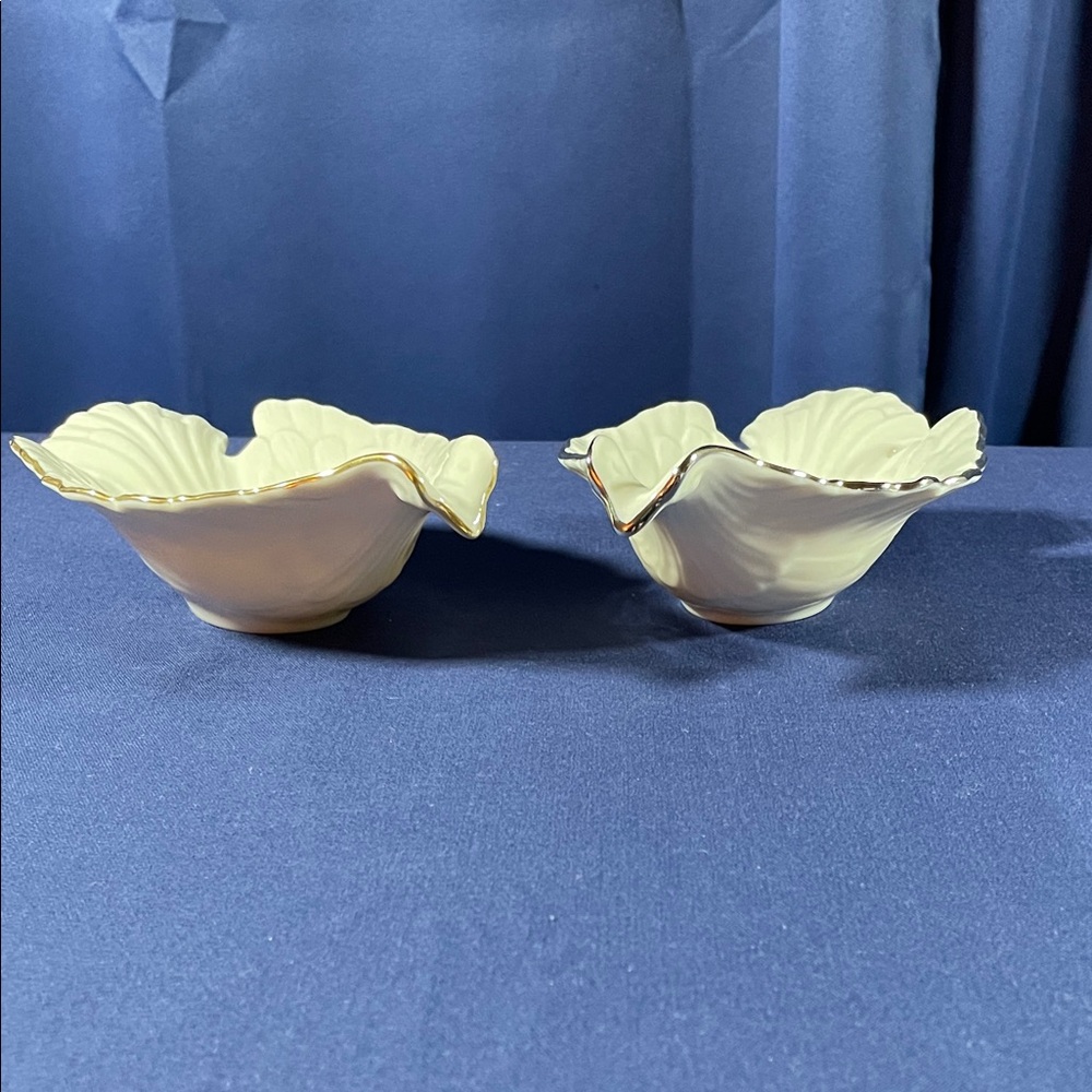 Two dove dishes one gold trim one silver trim